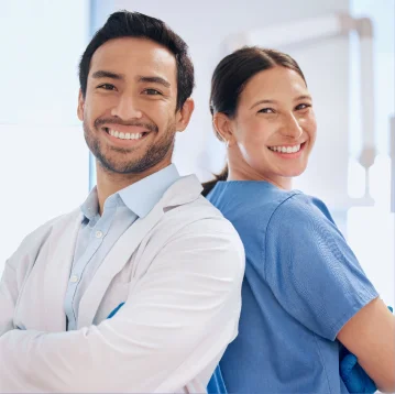 Oral surgeon providing attentive patient care