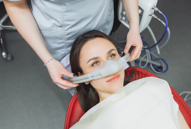 Patient under sedation during dental procedure